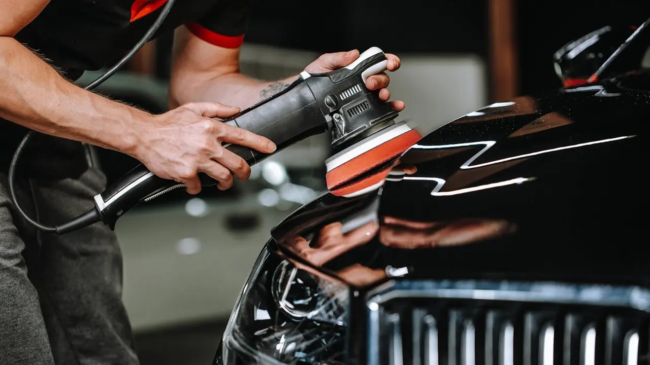 Machine polishing a car panel