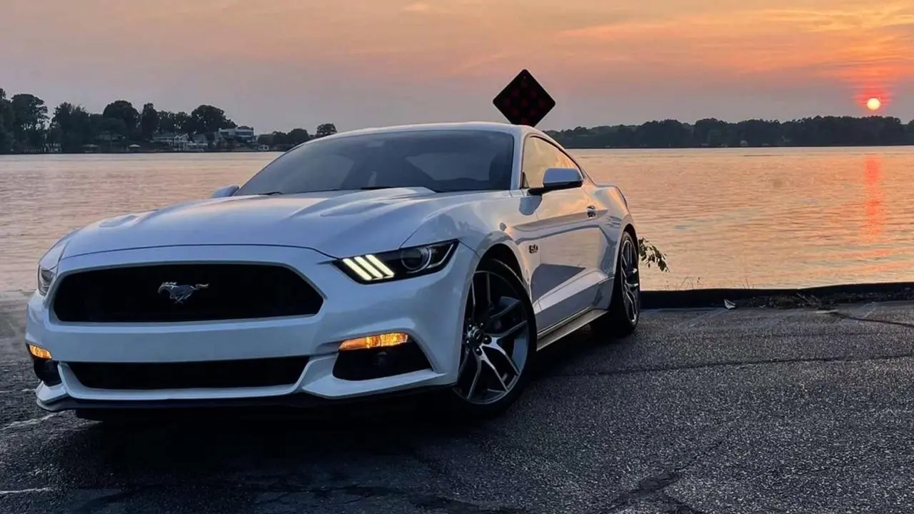 White Mustang at the lake after ceramic coating